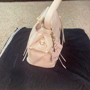 White leather handbag